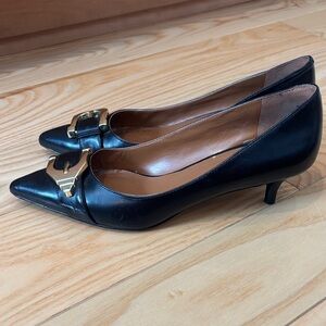 Chic Black Leather Heels with Gold Accent